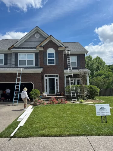 Bridger Design + Build crew in action replacing fascia and trim in Nashville
